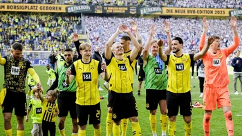El Dortmund asegura su lugar en la Champions con goleada ante un descendido Kiel El Dortmund asegura su lugar en la Champions con goleada ante un descendido Kiel